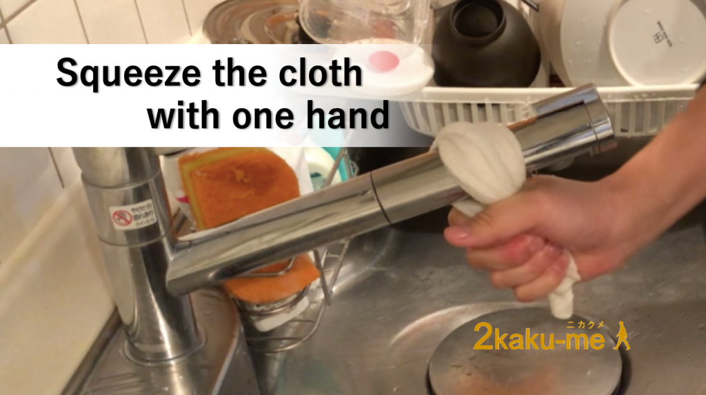 Squeezing the cloth with one hand for stroke survivors